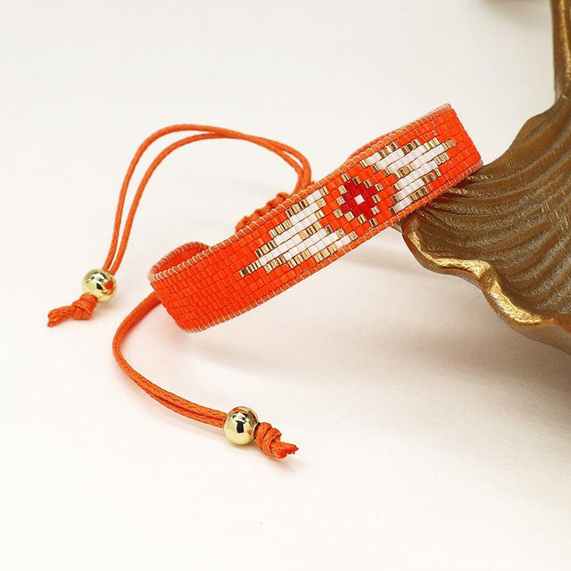 Pom Boutique Bright Orange 'Evil Eye' Handloomed Beaded Bracelet