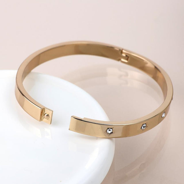 Faux Gold Star Embossed Hinged Bangle with Crystals
