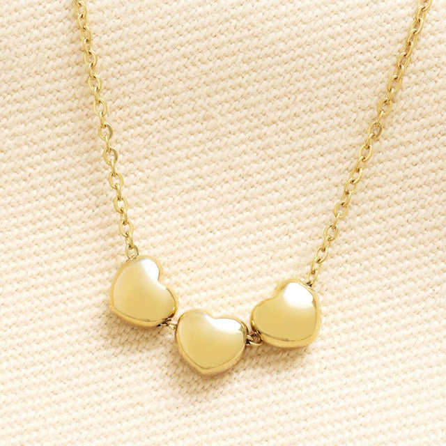 Triple Heart Charm Necklace in Gold