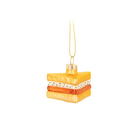 Glass ornament shaped like a layered cake