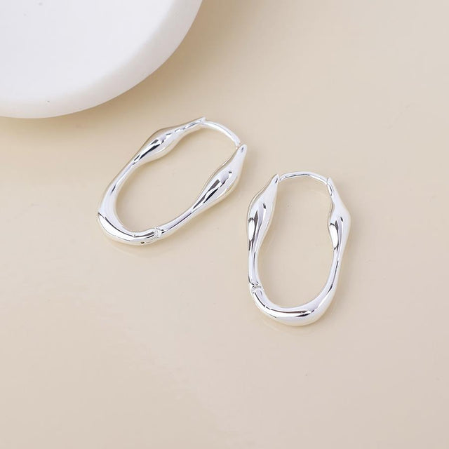 Silver Flux Huggie Earrings