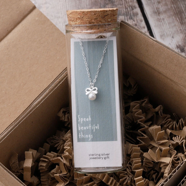 Attic Creations Bow With Pearl Pendant Necklace in Silver