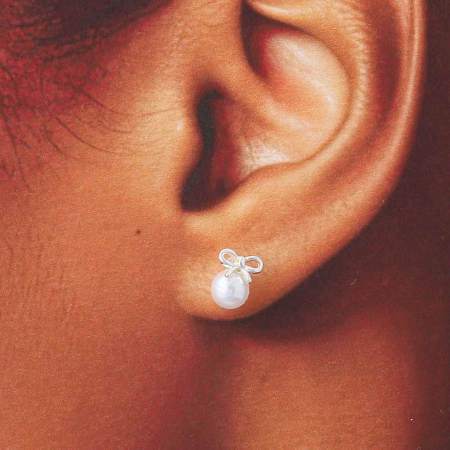 Attic Creations Silver Bow With Pearl Stud Earrings Close Up