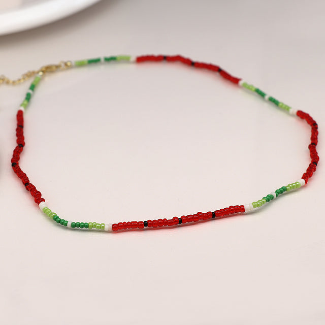 Pom Boutique Green and Red Watermelon Inspired Tiny Bead Necklace Close Up