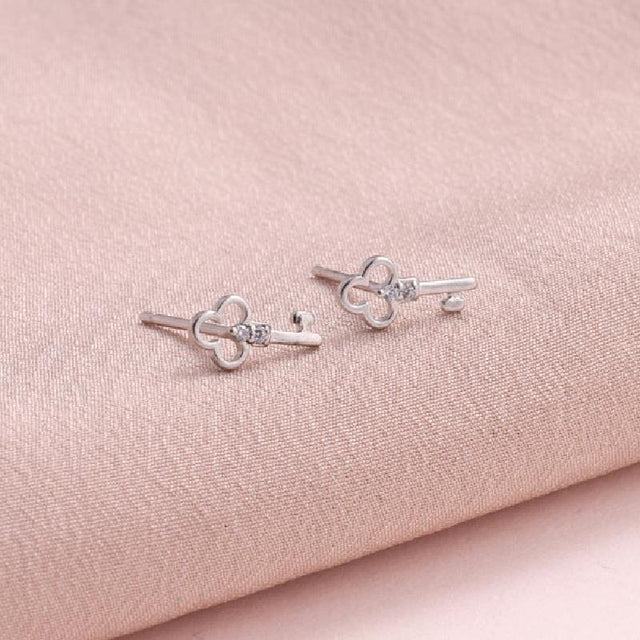 Curiosity Crystal Key Earrings in Silver Close Up