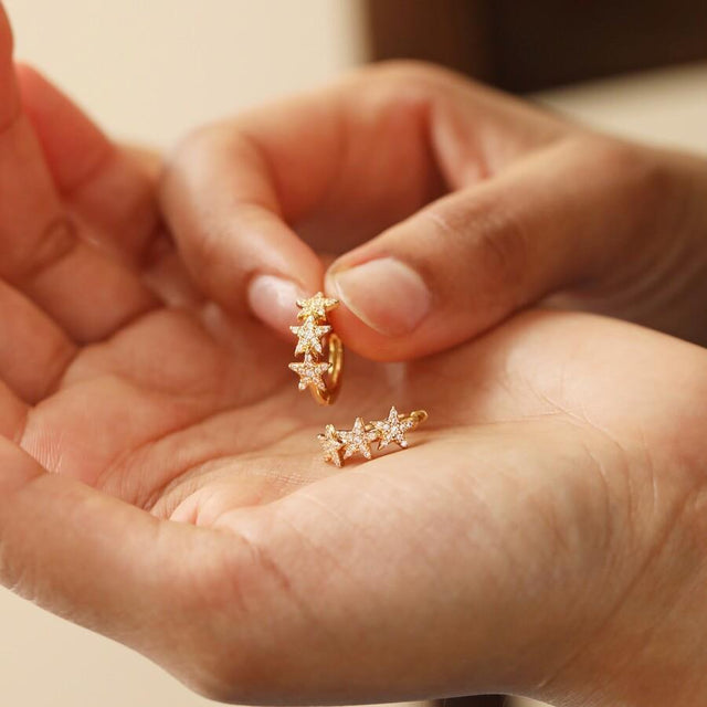 Lisa Angel Crystal Triple Star Huggie Earrings in Gold Close Up