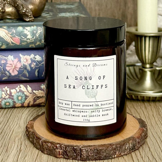Strings and Dreams A Song of Sea Cliffs Candle Jar Close Up