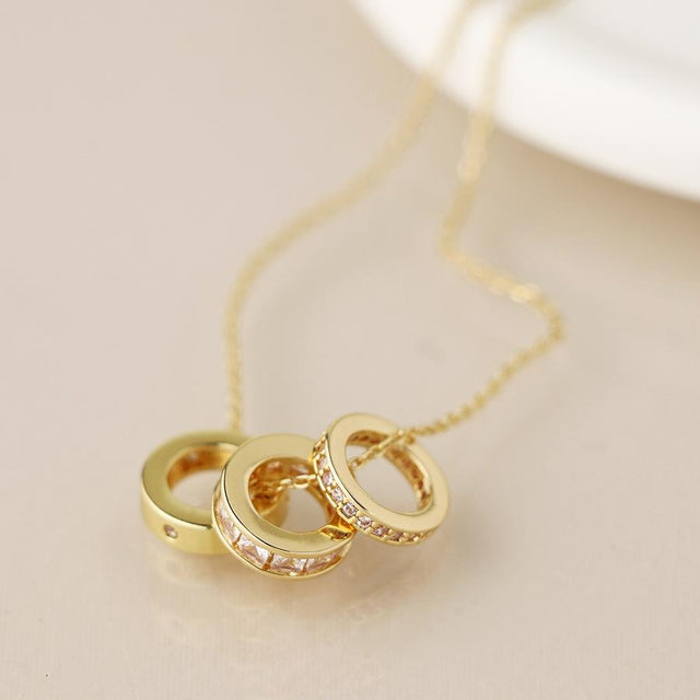 Pom Boutique Faux Gold Triple Mini Crystal Rings Necklace Close Up