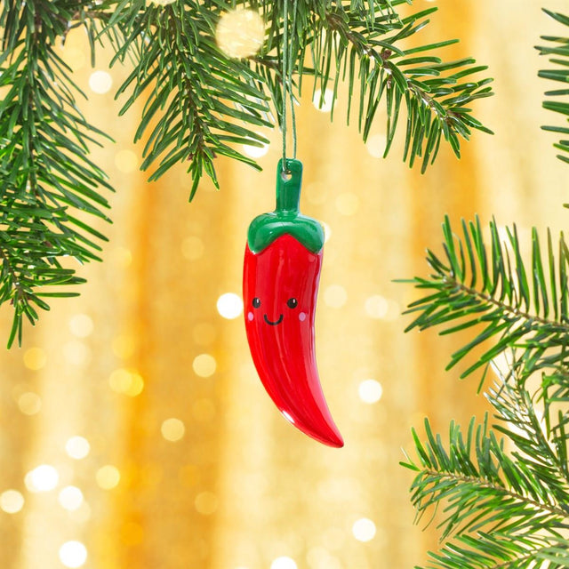Sass and Belle Chilli Pepper Ceramic Decoration hanging from a Christmas tree.