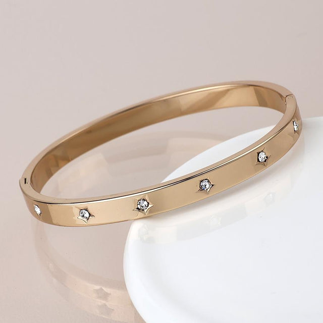 Faux Gold Star Embossed Hinged Bangle with Crystals