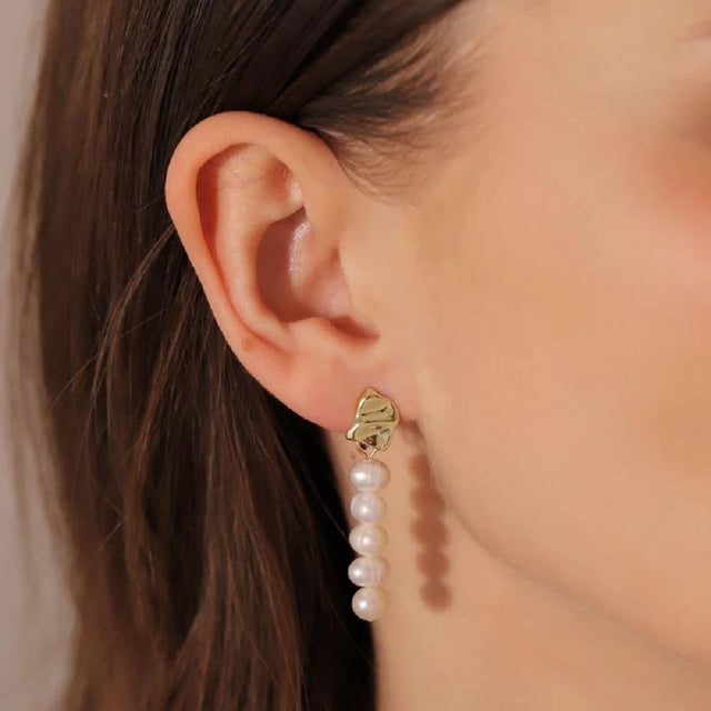 Gold Trip Long Pearl Drop Clip On Earrings in Gold on Model