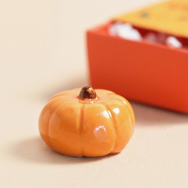 Tiny Matchbox Ceramic Pumpkin Token Close Up