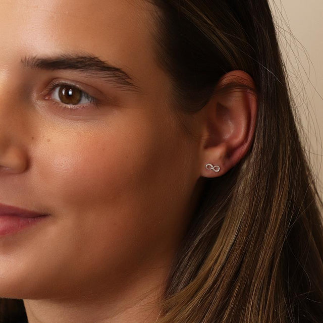 Sterling Silver Infinity Stud Earrings on Model