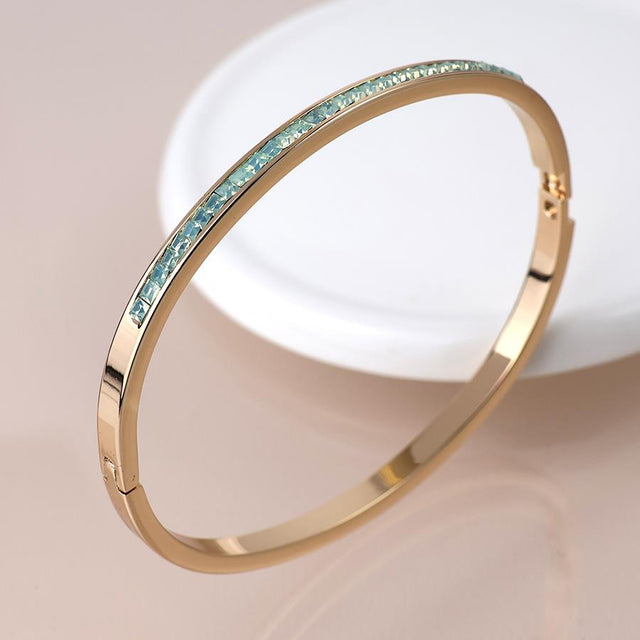 Faux Gold Slim Hinged Bangle with Green Crystals