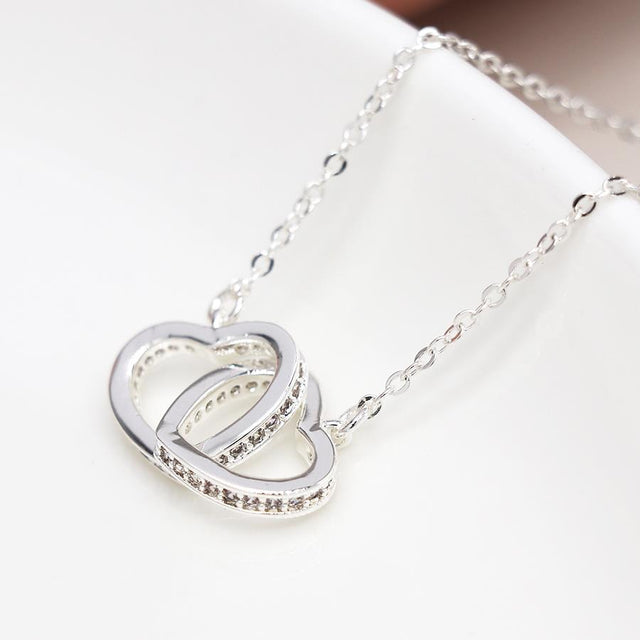 Silver Crystal Edged Linked Hearts Necklace