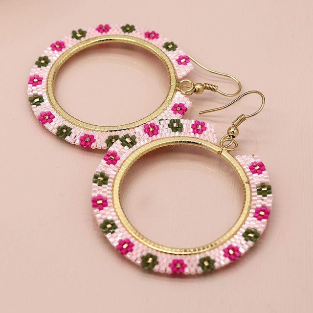Large White Beaded Circle Earrings with Flowers