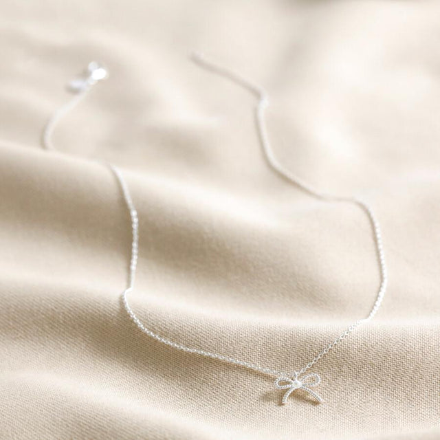 Silver Tiny Pearl Bow Necklace