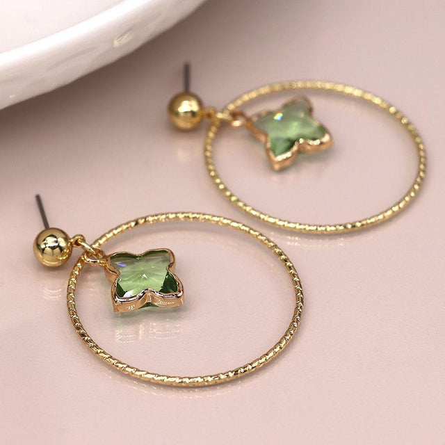 Pom Boutique Hoop and Green Star Stone Drop Earrings Close Up View