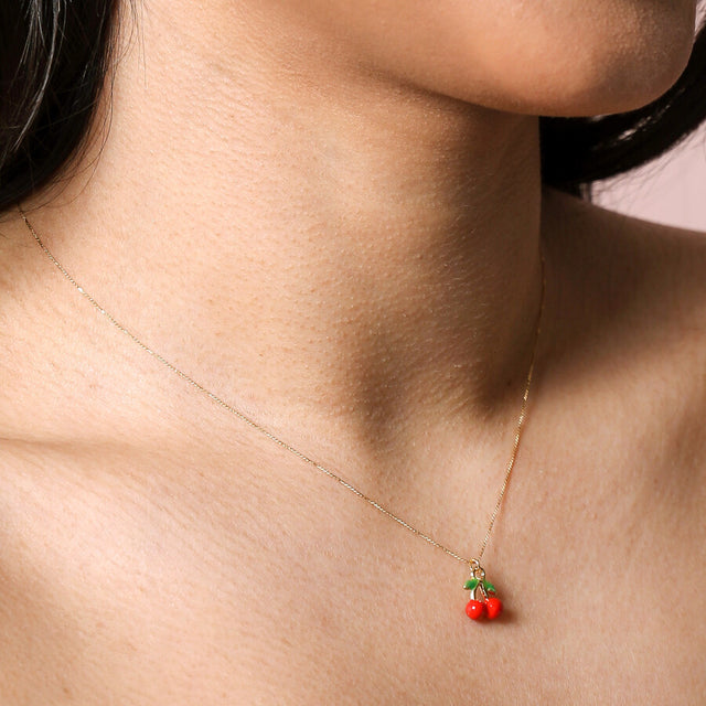 Lisa Angel Red Cherry Enamel Pendant Necklace in Gold on Model