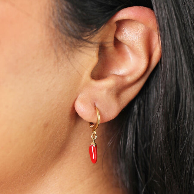 Red Chilli Huggie Hoop Earrings in Gold on Model