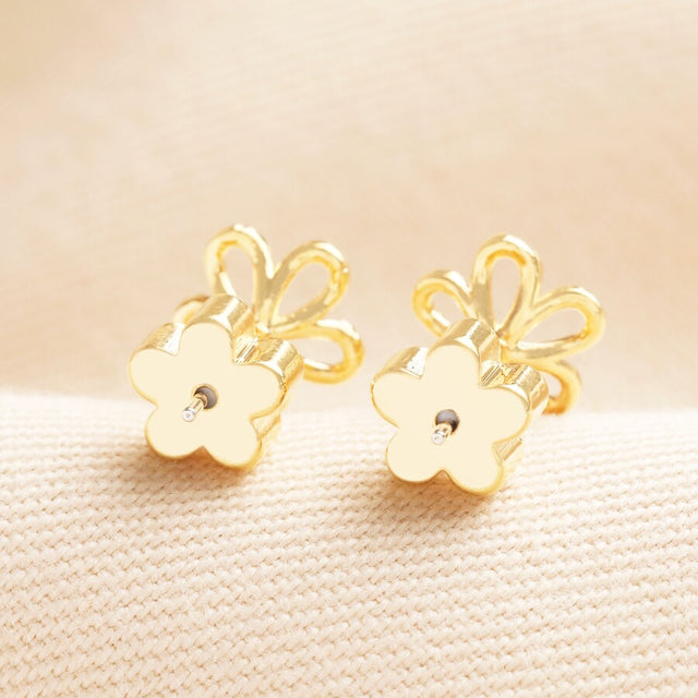 Flower Outline Stud Earrings in Gold with Flower Backs Close Up of Backings