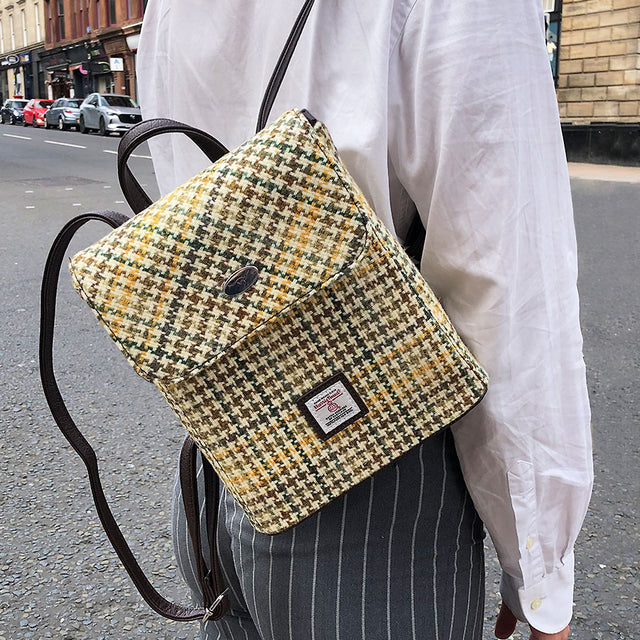 Harris Tweed Tummel Mini Backpack in Yellow, Green & Brown Dogtooth on Model