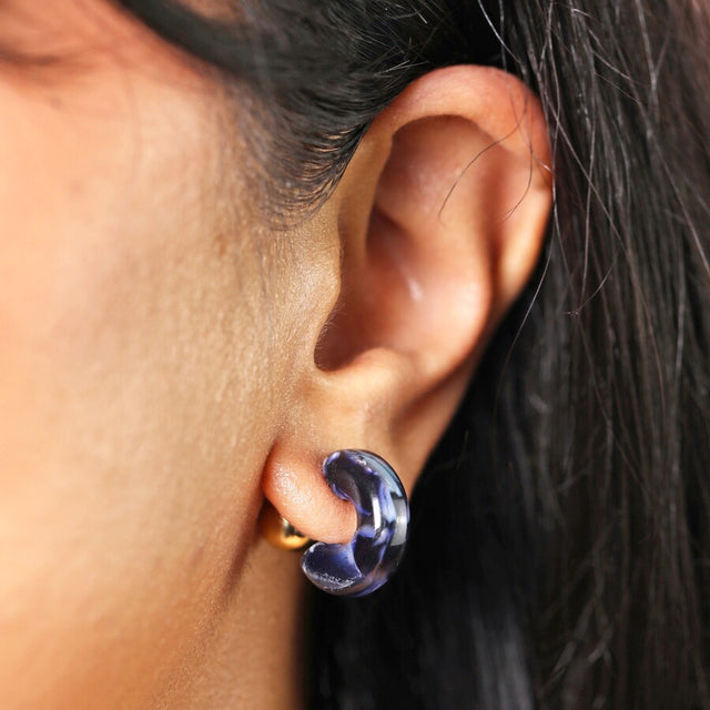 Lisa Angel Blue Marbled Chunky Hoop Earrings in Gold on Model