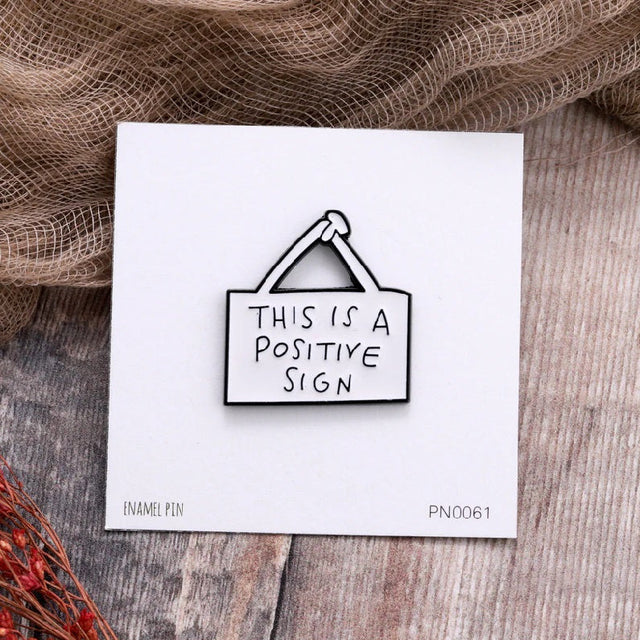 This is a Positive Sign Enamel Pin Badge