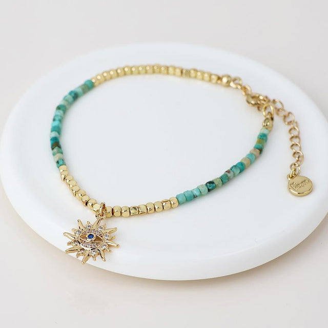 Faux Gold Turquoise Bead Sun Charm Bracelet