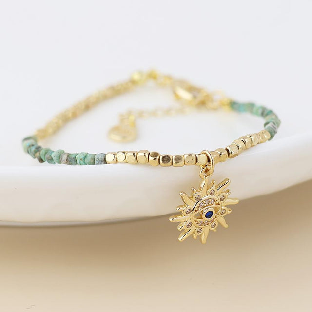 Faux Gold Turquoise Bead Sun Charm Bracelet