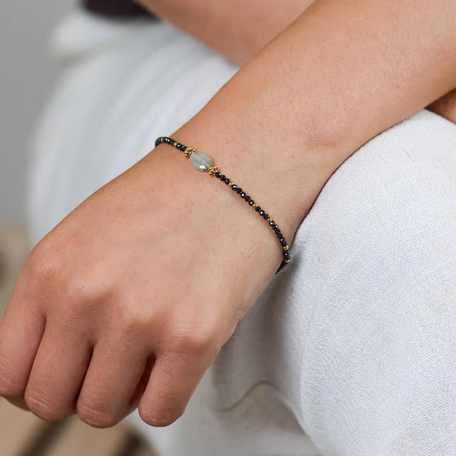 Gold and Black Beaded Bracelet on Model