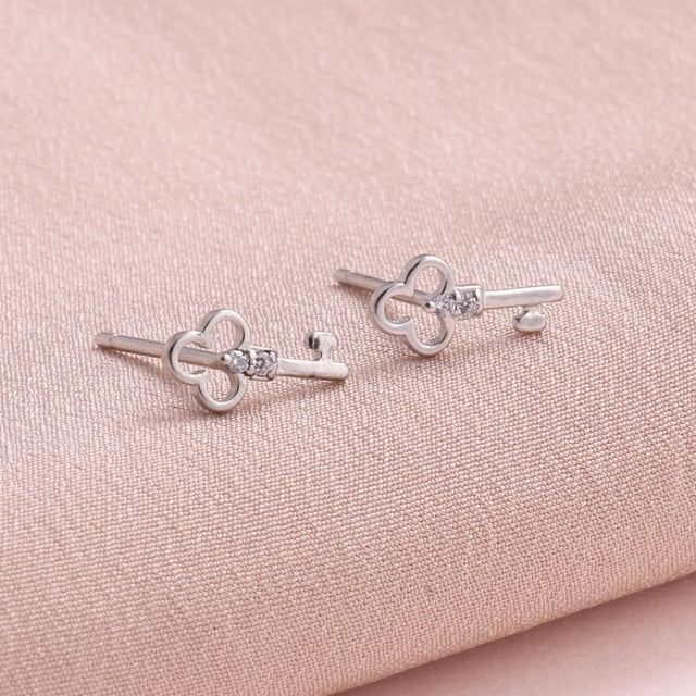Curiosity Crystal Key Earrings in Silver Close Up